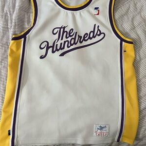 The Hundreds White Jersey with Purple Trim and Yellow Stripe